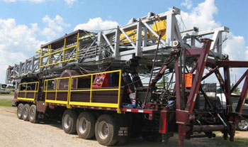 Service King Manufacturing SK 775 Carrier mounted Oil and gas rig.